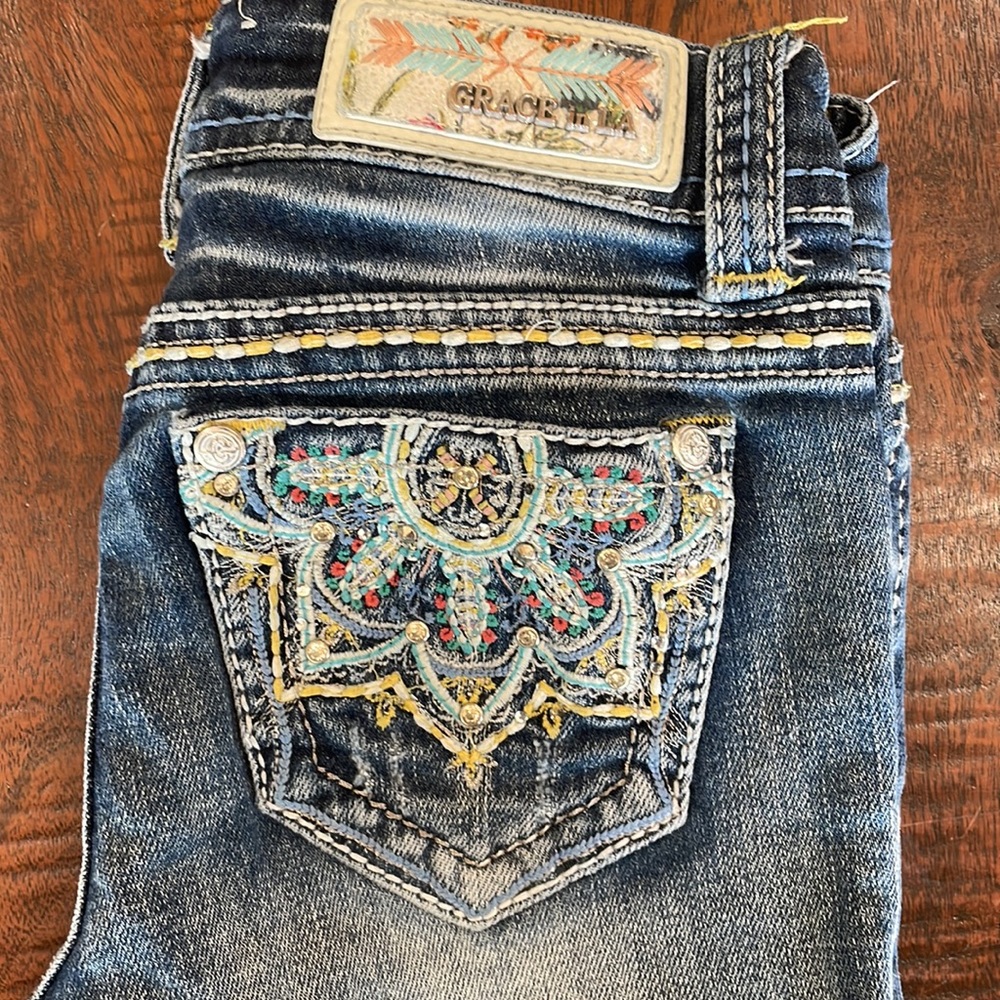 Grace in LA girls size 8. Cute stitch and bling